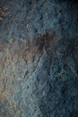 ancient black stone with elements of aging