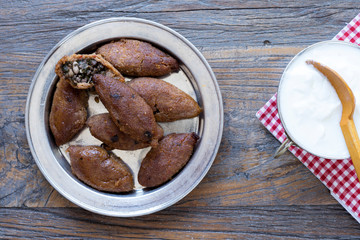 oruk, kibbeh plate over wooden table