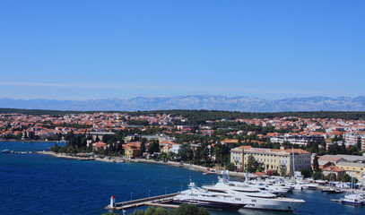 City on the Adriatic Sea, luxurious apartment buildings near the water, promenade, main bridge Zadar, Croatia. A tourist place, a beautiful and clean city in Europe.Photography for tourism advertising