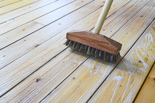 spring cleaning wooden floor with soft soap