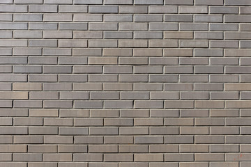 Background texture of a gray brick wall.