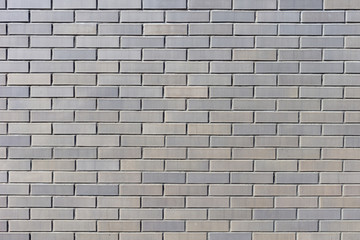 Background texture of a gray brick wall