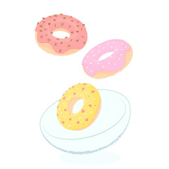 Donuts with colored icing fall into the plate