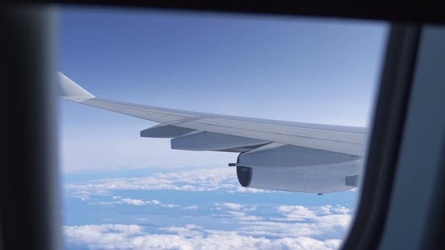 Plane wing during the flight In 4K Slow motion 60fps