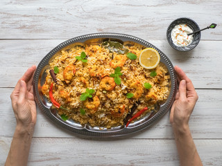 Indian Biryani with shrimp. Tasty and delicious prawns biryani, top view