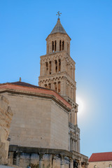 Fototapeta na wymiar SPLIT, CROATIA - 2017 AUGUST 15. Sun behind the bell tower of the Cathedral of Saint Domnius.