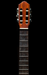 Guitar neck without strings isolated on black background. Details of a guitar, abstract background.