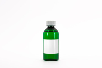 Green color pharma grade empty glass bottle with white cap. High Resolution. Mock up