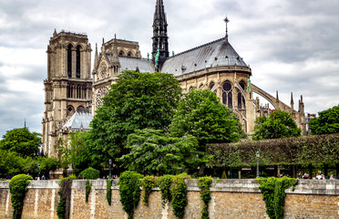 Obraz premium Notre Dame de Paris cathedral on Ile de la Cite viewed from River Seine .