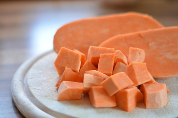 diced sweet potato on a chopping board
