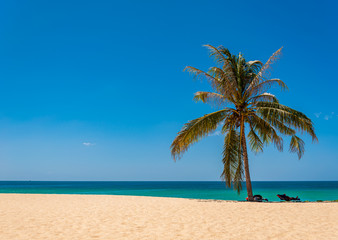 Beach with white sand and blue sea and sky in summer season