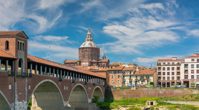 Historical covered bridge over the Ticino River in Pavia City in Italy Pavia, Province og Pavia, northern Italy, june 28,2015