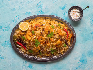 Indian Biryani with shrimp. Tasty and delicious prawns biryani, top view