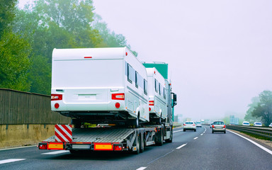 Truck carrier with motor homes rv on road of Slovenia reflex - 340708113
