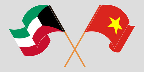 Crossed and waving flags of Kuwait and Vietnam