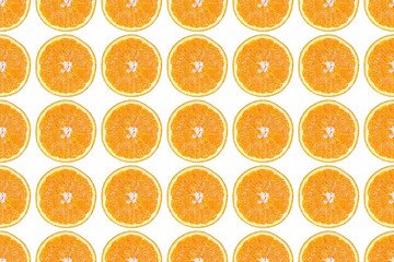Seamless pattern of isolated slices of orange. Wallpaper for background, design and packaging.