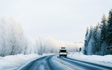 Caravan in a road winter Rovaniemi reflex