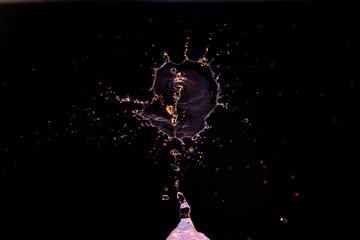 Fototapeta na wymiar High speed macro photography of a water drop splashing