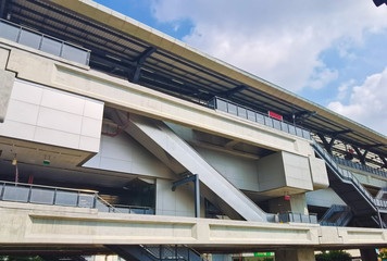 Architecture construction of elevator, escalator stairs and sky walk way, walk bridge between sky train station and shopping mall