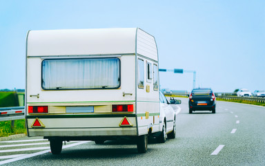 Fototapeta premium Camper in road in Warsaw Poland reflex