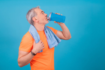 adult or senior man with sportswear isolated on color background