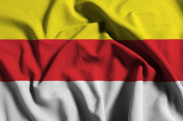Flag of Münster Westfalen, Germany, with waving fabric texture	
