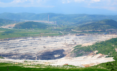 Surface ground charcoal exploitation. Industrial coal mining.