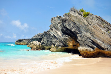 A colorful rock on a pink beach in Bermuda.