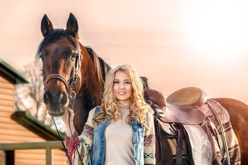 Pretty blondy women with the horse