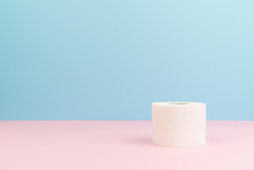 Conceptual image of toilet paper roll standing alone.