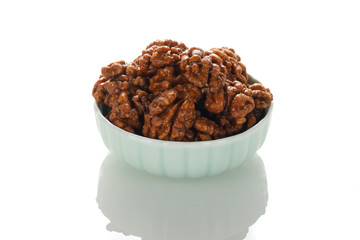 Walnuts on a white board