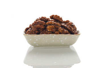 Walnuts on a white board