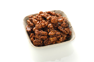 Walnuts on a white board