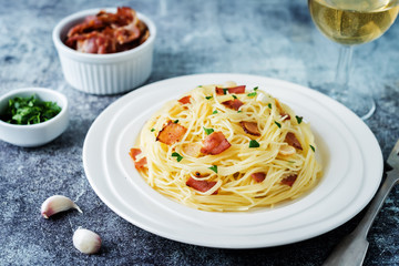 Bacon garlic parsley pasta in a plate