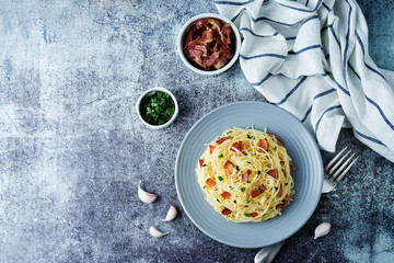 Bacon garlic parsley pasta in a plate