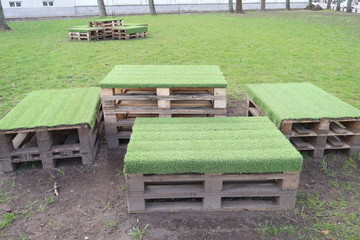 Eco-friendly furniture made of pallets. Table and seats made of pallets

