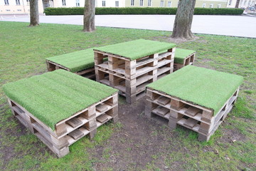 Eco-friendly furniture made of pallets. Table and seats made of pallets

