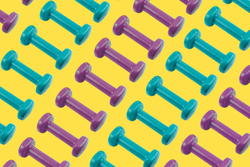 Colorful pattern made of blue and purple dumbbells