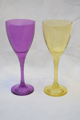 Mock up design set of elegant and traditional drink ware / drinking glass & Jar for wine or juice, colorful transparent isolated on black background 