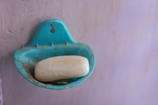 white soap in a sky blue basket  - Powered by Adobe