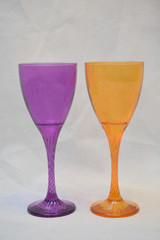 Mock up design set of elegant and traditional drink ware / drinking glass & Jar for wine or juice, colorful transparent isolated on black background 