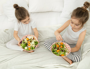 Healthy food, children eat fruits and vegetables.