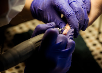 Women do manicures at home. Self-isolation manicure. Nail salon