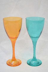 Mock up design set of elegant and traditional drink ware / drinking glass & Jar for wine or juice, colorful transparent isolated on black background 