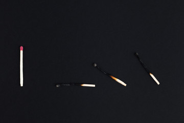burnt matches, distance concept, demonstration of how virus transmission works, domino effect.