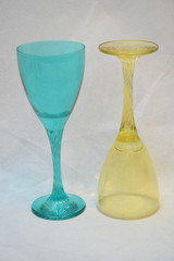 Mock up design set of elegant and traditional drink ware / drinking glass & Jar for wine or juice, colorful transparent isolated on black background 