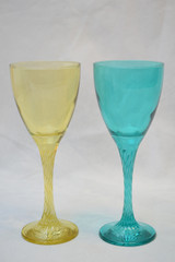 Mock up design set of elegant and traditional drink ware / drinking glass & Jar for wine or juice, colorful transparent isolated on black background 