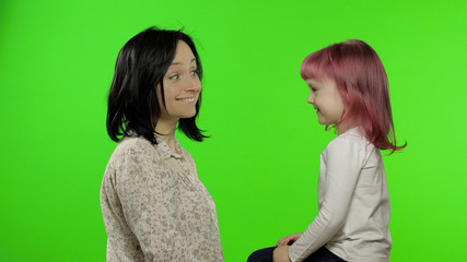 Mother and little daughter laughing, playing together. Chroma Key. Mothers day