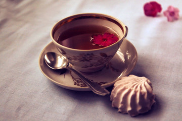 cup of tea with rose