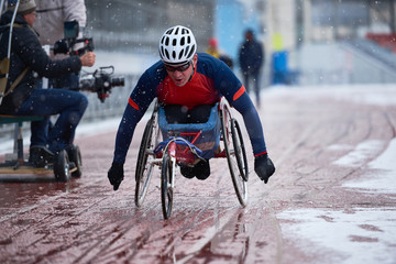 Male athlete with disability participating in wheelchair racing competition